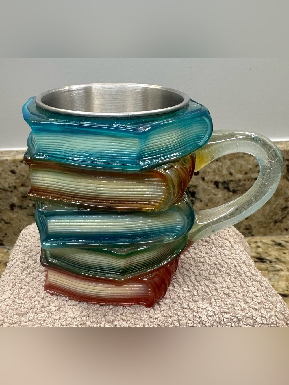 Stacked Book Resin Mug with Blue, Green & Red Accents